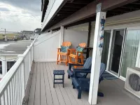 Spectacular Beachfront Condo-Watch sunrise from deck overlooking beach.