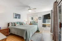 Dog-friendly beach home with screened porch, charming interior, & W/D