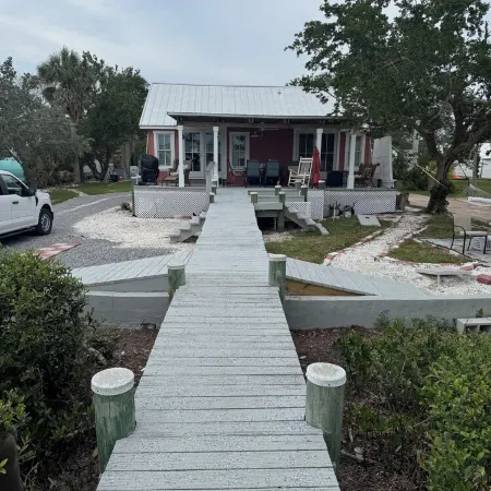 Private historical completely renovated cottage with  60 ft dock on Sarasota Bay