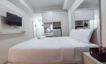 Warm and Cozy Style Studio Room at Paltrow City Apartment