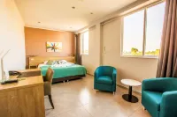 Q イン ブティック ホテル パラマリボ動物園周辺のホテル