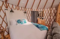 NEW! Peacock/River Yurt Village/Couples Yurt/Hot Tub/Close to Town!
