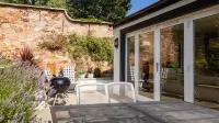 Luxury cottage with garden and parking in the heart of the village.  Sleeps 8.