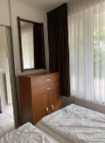 Holiday home at a copse and small lake, close to the beach