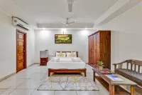 Blossoms Hotel and Service Apartment