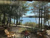 Welcoming 4-bedroom lake front cabin in charming Otis on Beech Hill Pond.