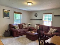 Charming 2-bedroom cottage located on a beautiful property. AC, Wifi, & laundry