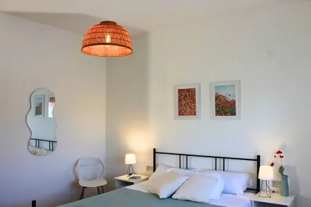 Dimidium Apartment Отели рядом с достопримечательностью «Spiaggia Le Dune di Piscinas»