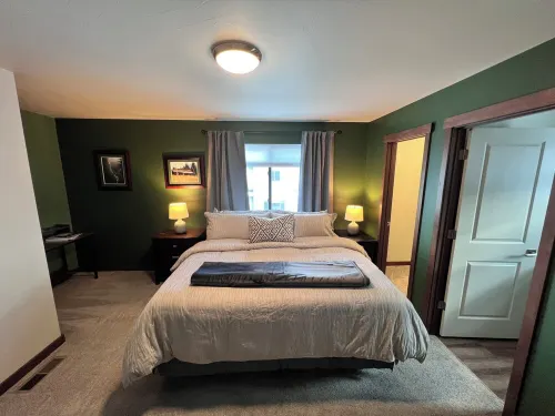 The place to stay: pool table, king bed.