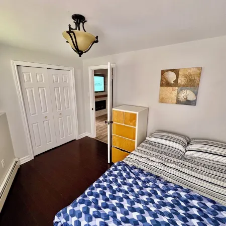 Private walkout basement apt with free parking spot.