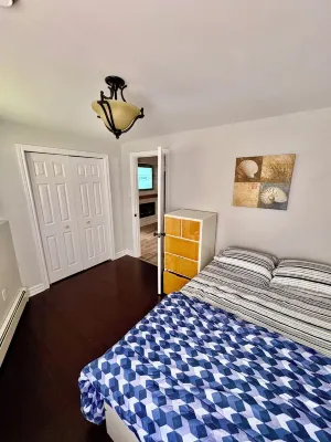 Private walkout basement apt with free parking spot.