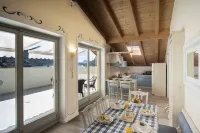 Penthouse with lake and mountain views in Molveno Hotels in Molveno