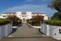 Apartment in residence with swimming pool and private beach