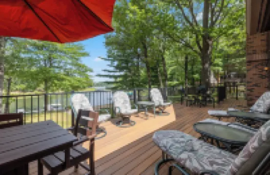 Whitefish Chain Lake Home with Beach + Sauna + King Beds + Kayaks +Paddle Boards