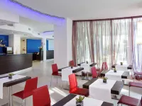 裏米尼郎格梅爾美居酒店 - 早餐