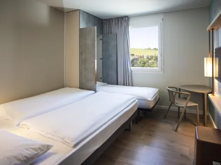 Ibis Budget Fribourg Отели в г. Муртен