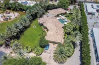 The Date Palm Estate by AvantStay Expansive Estate w Game Room Backyard Oasis w Pool Spa