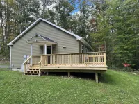 Secluded mountain home on over 10 wooded acres, modern, WiFi and pet friendly!