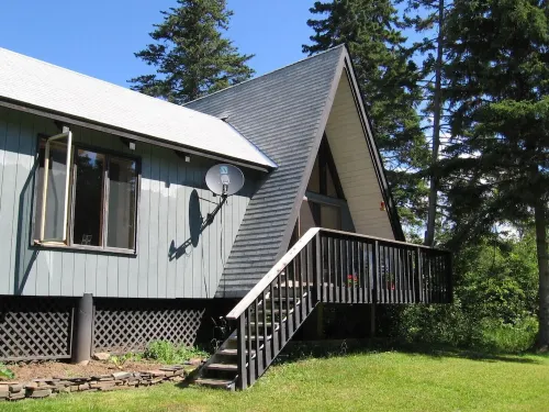 Secluded Forest Retreat With The Little Devil Track River Running Through.