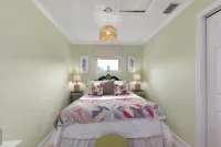 The Pink House Unit B: A Cozy Retreat Steps from the Beach
