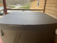 3BR, 2 Bath Cabin with full kitchen, living room, and hot tub.
