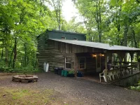 Comfy cabin in the woods with huge party deck