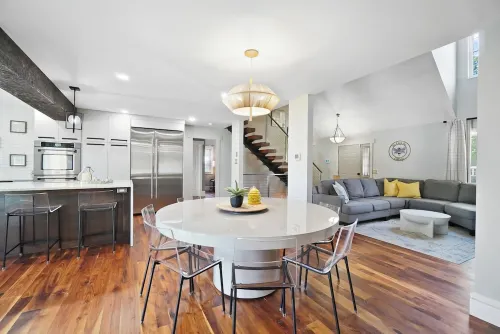 High-end home w/ fireplace, gourmet kitchen, sauna, game rm/ large yard/fire pit