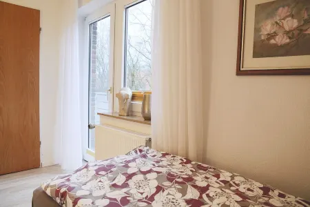Ferienhaus Wilhelmine - Apartment sole upper floor Отели в г. Крумхёрн