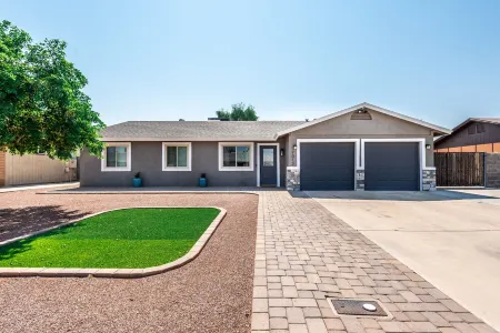 Resort Style Backyard- Heated Pool, Putting Green, Outdoor TV and Pool Table.