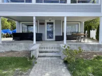 The Inn at Highland Lake, 1st Floor, waterfront yard with a boat dock