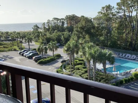 Gorgeous ocean view villa with spacious balcony and private beach access.