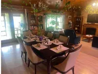 Log Cabin house on 10.5 acers of wooded land. Accommodates 20 plus guest.