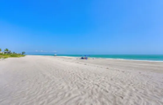 Tropical Garden Condo Just Steps to Sanibel Beach