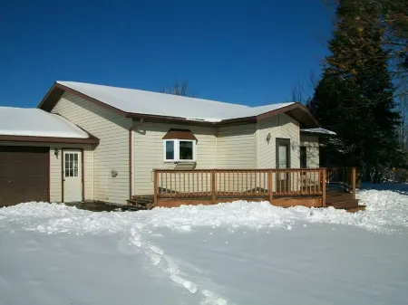 Beautiful, spacious 3 BR, 2BA home, close to everything the UP has to offer!