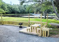 Glamping in Vintage Airstream with modern comforts with private pond access.