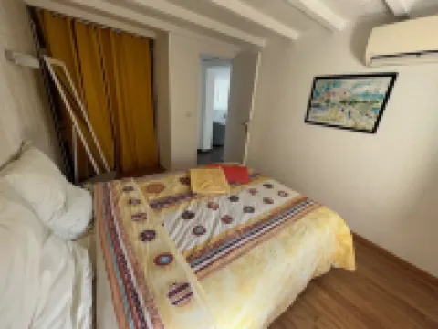 Air-conditioned apartment - All comforts - with garden and parking space