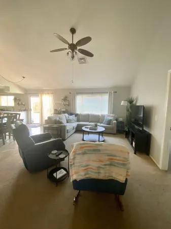 4 BR, 2 BA home with heated pool located near shopping, dining & entertainment