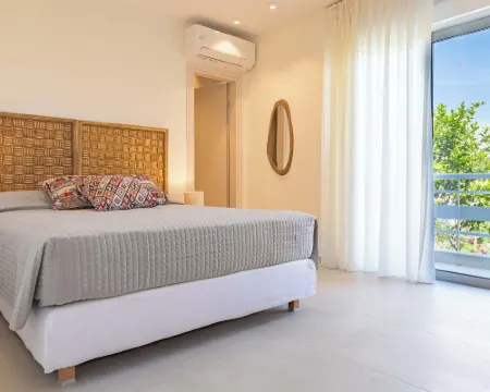 Arancia Elegant Rooms and Suites Hotels in Tolo