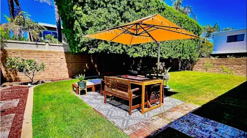 Sunny Surfside Stay – 4BR, Pet-Friendly w/ BBQ Patio Just Steps to the Beach!