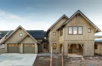 Luxury living and scenic views of Tetherow, just off the 18th green. 5Bed, 4Bath Hotels near Wintercreek Nursery