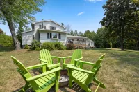 Spacious Backyard and Cozy Fire Pit - Charming Getaway Retreat