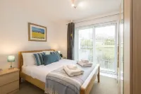 The Beach House & Porth Sands Apartments Hotels near The Bird