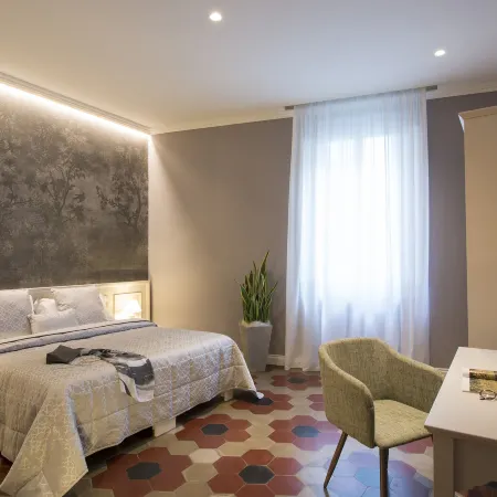 Pistoia Inn - Downtown's Charming Rooms