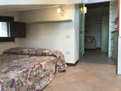 Top floor small loft overlooking the old town near to the beach Hotels near Carlo Contini Council Picture Gallery