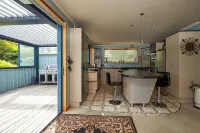 Akaroa Holiday Home.  Spacious, sunny, harbour views and close to town. Sleeps 8