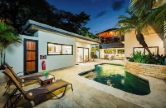 Iguana Surf Villas,  6 bedrooms, 6.5 bathrooms,  5 kitchens center of Tamarindo