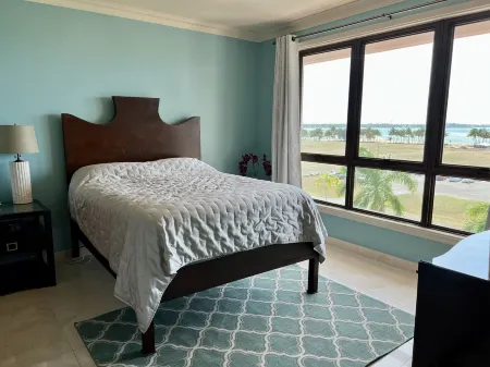 Views! Views! Penthouse with Membership Golfing, Beach, Pool and 2 Carts