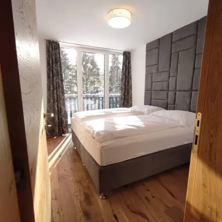 Exclusive apartment with mountain views in a ski paradise