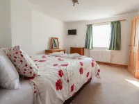 Katy's Cottage Hotels near Next
