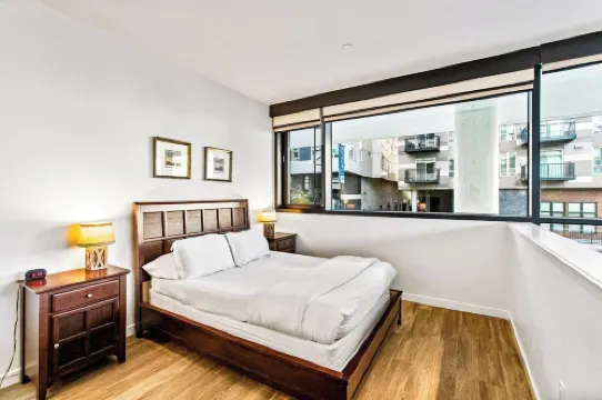 Airy and Open Corner Loft - 92 Walkscore